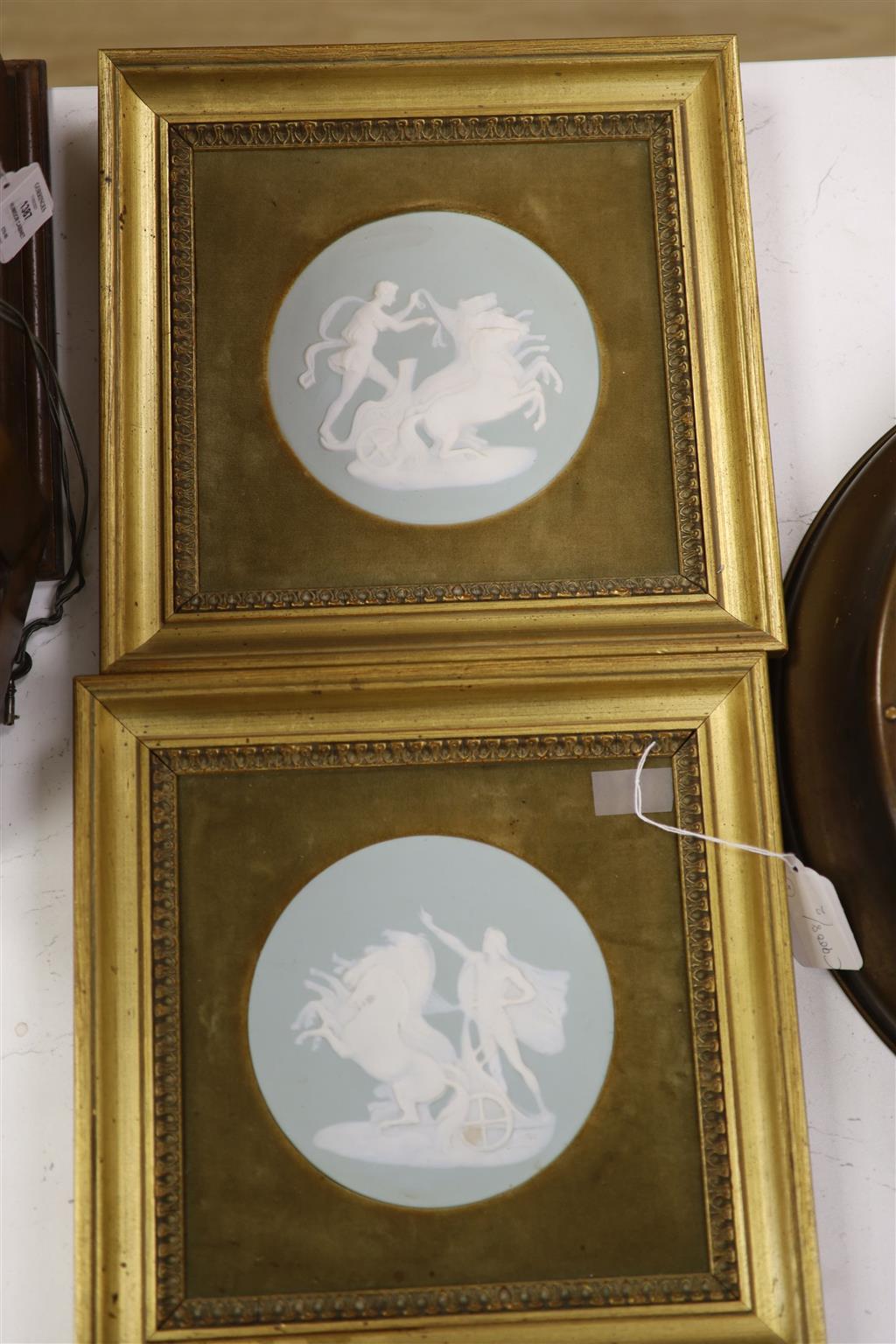 A pair of Limoges pate-sur-pate ceramic plaques, by Camille Tharaud, 5.5cm diameter (not including mount or frame)